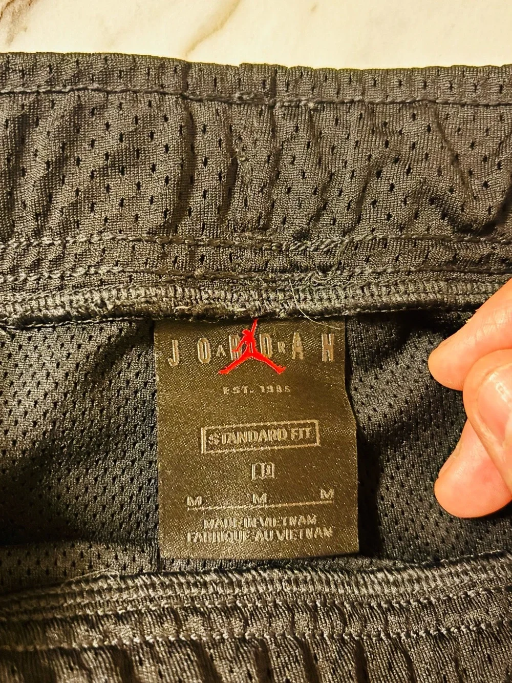 Jordan Black Athletic Mesh Shorts with Red Logo Accent